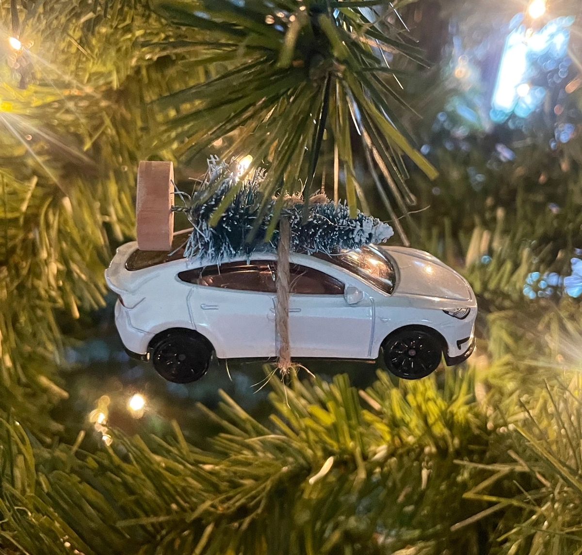 Tesla Model Y White Carrying Christmas Tree Christmas Ornament Hot Wheel