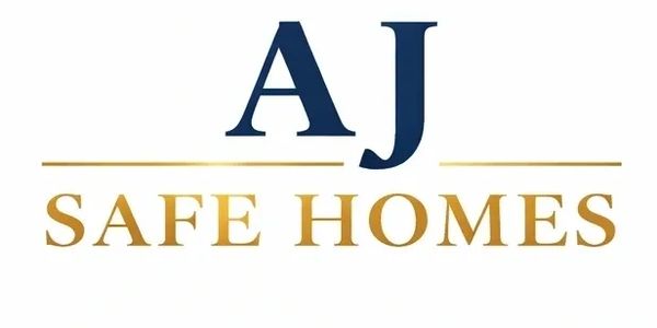 A shield emblem with a house and golden swoosh around it.