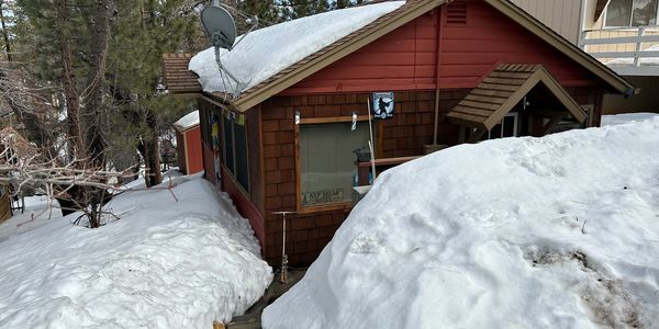 Deck and patio snow removal from Big Bear Cabin Care.