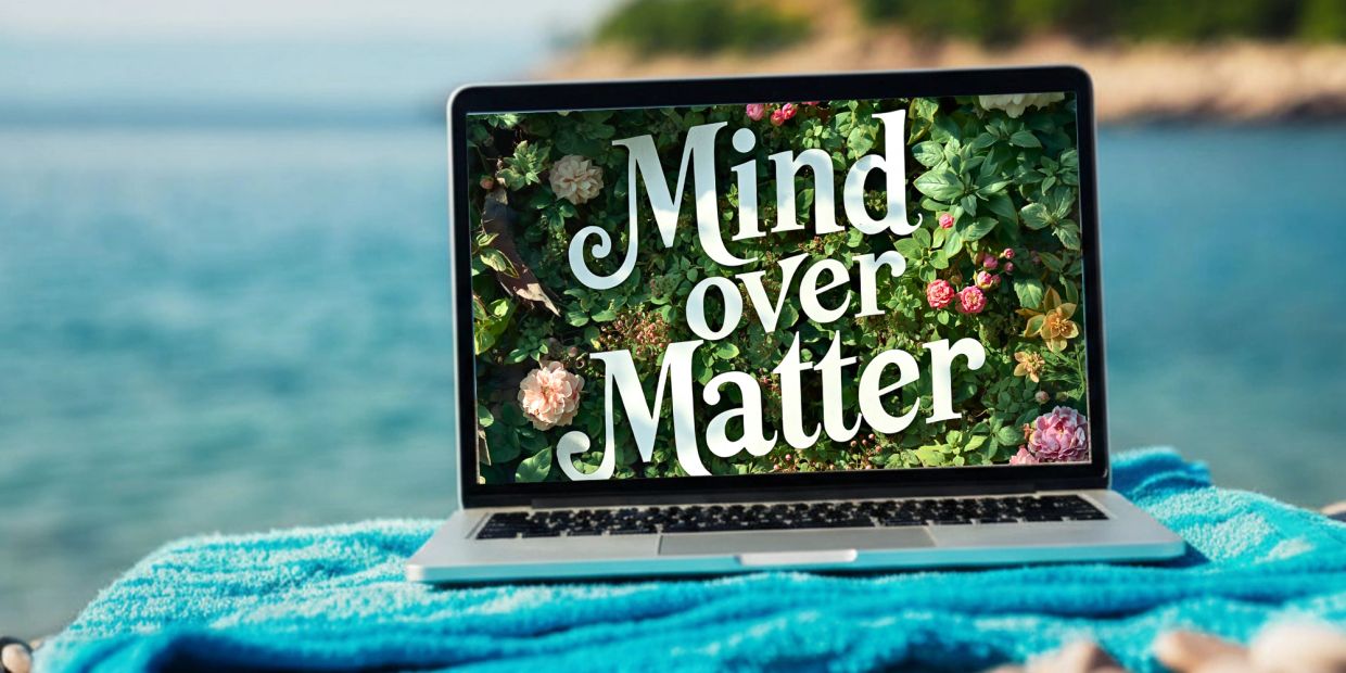 Laptop screen with the phrase 'Mind over Matter'.