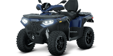 Dark blue all-terrain vehicle with rugged tires and bright headlights.