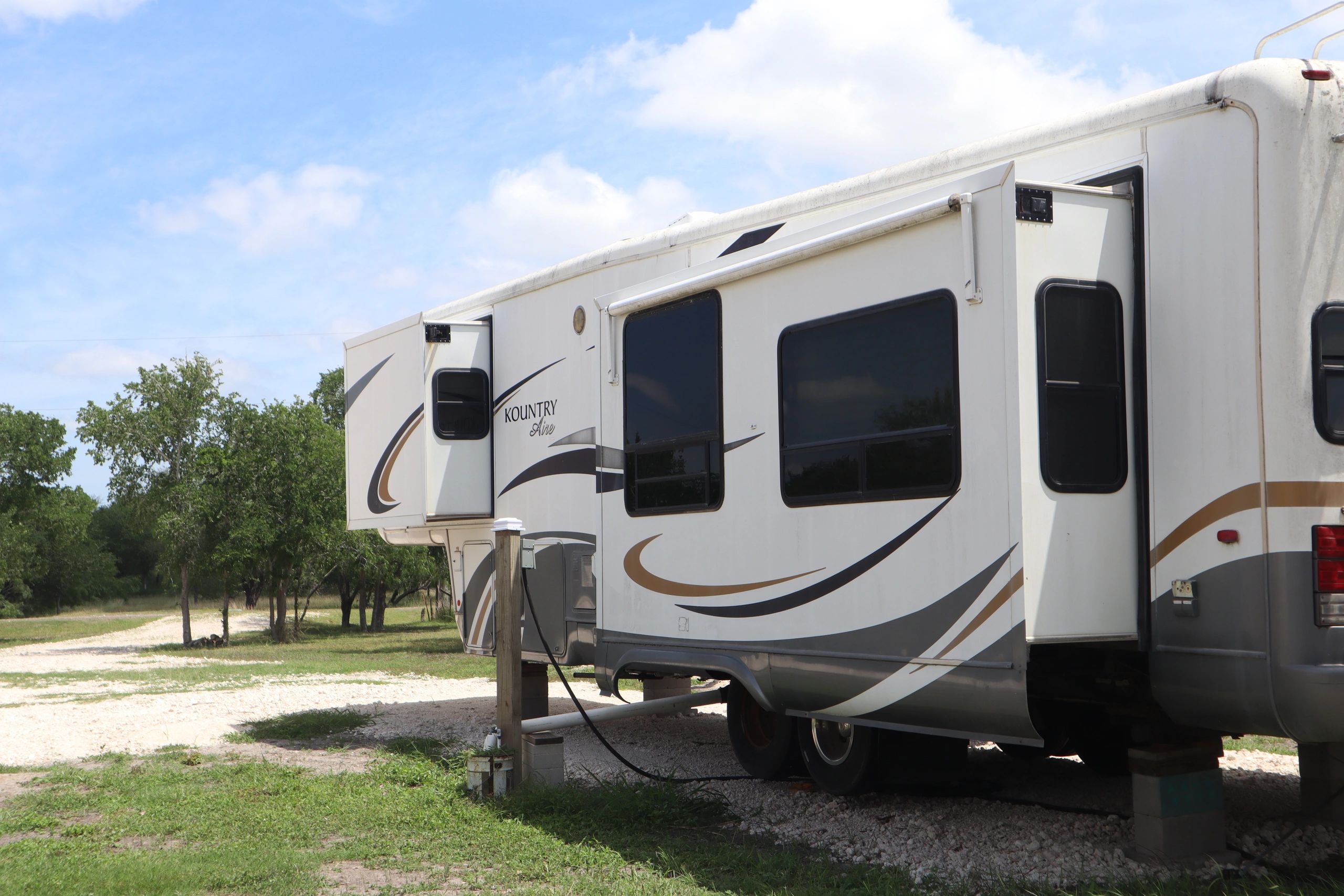 Kountry Aire RV parked on a sunny day.