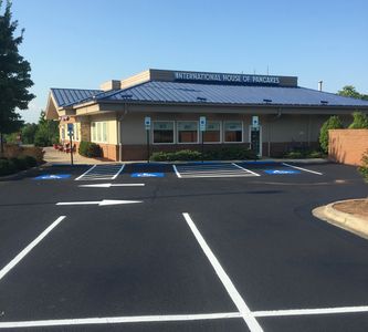 Fresh commercial asphalt sealcoating and line striping 