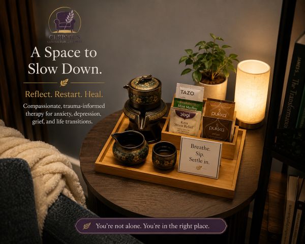Cozy therapy space promoting healing and calm with tea setup and soft lighting.