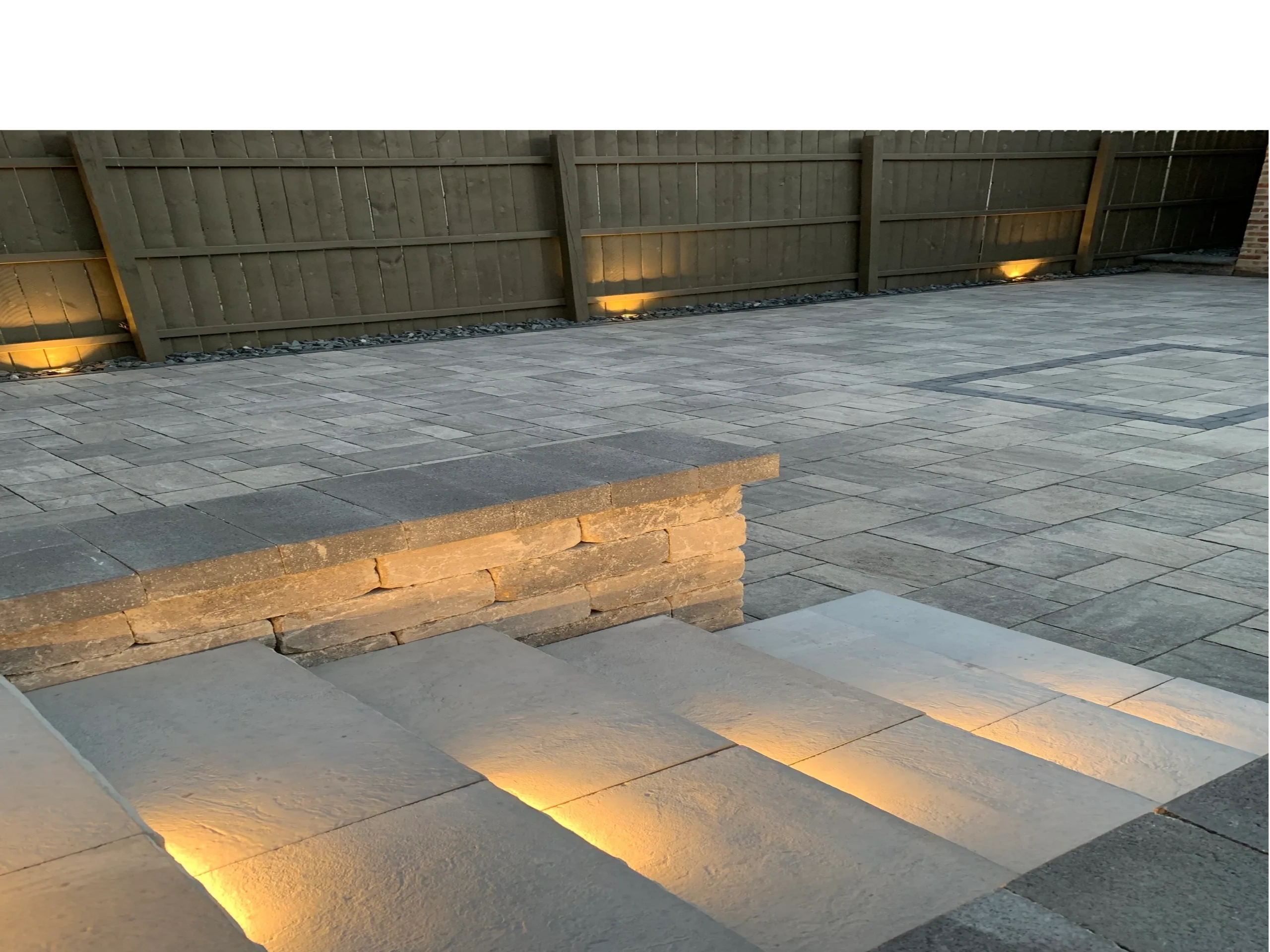 landscaping paver  patio with lighting and paver steps 