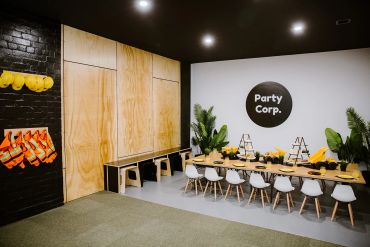 Party room with a long table and chairs.