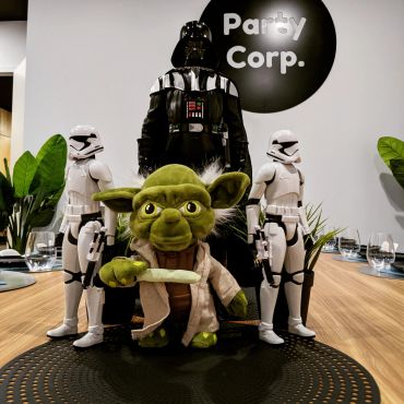 Star Wars figurines displayed in an office setting.