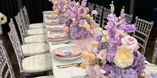 table set up with flower centrepieces