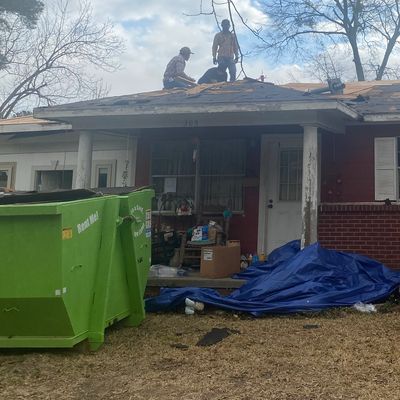 severely damaged brick home in need of repair