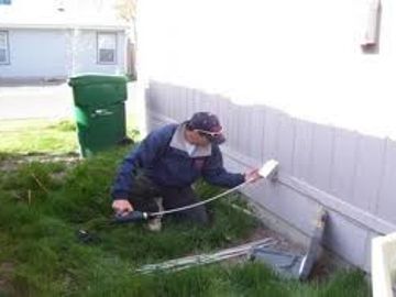 the tech is doing a Standard dryer vent cleaning. By brushing in from the out side. 