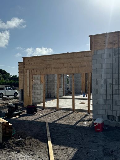 Wood and concrete frame at building construction site.