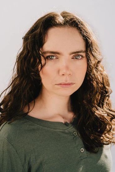 Young woman with curly hair.