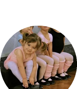 Children in ballet leotards dance studio Austin Texas