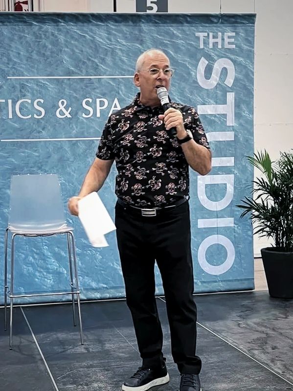 Allan speaking at the newly rebranded Be+Well Beauty and Wellness show