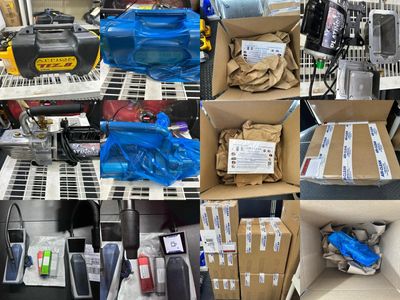 Various automotive parts and tools organized on shelves and in boxes.