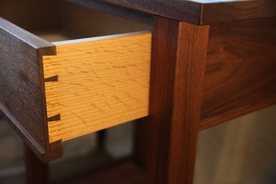 Walnut End Table with handcut half-blind dovetailed Red Oak drawers.  This table has 4 hidden areas.
