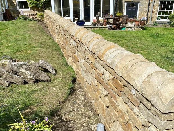 A stone wall hand built by Stevie Fairless in Hexham, Northumberland