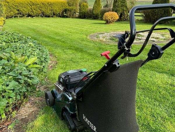 Stevie Fairless's lawn mower being used to maintain a garden in Hexham, Northumberland 