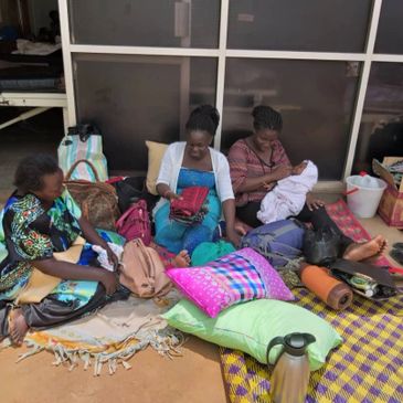 Informal Caregivers enduring outside the hospital ward.