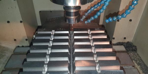 CNC milling machine shaping metal workpieces with precision.