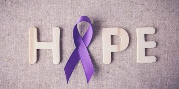 Purple ribbon replaces the letter O in the word HOPE on a textured background.