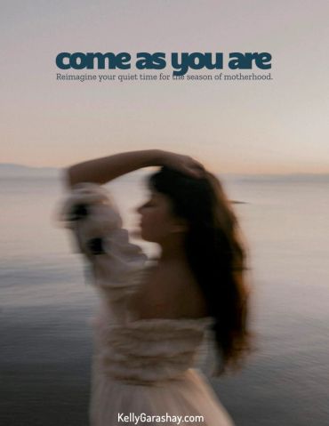 Blurry image of a woman by the water with text promoting motherhood reflection.