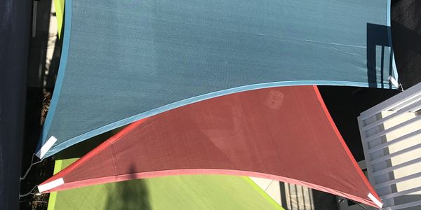 Sail shades providing shade, UV protection and privacy