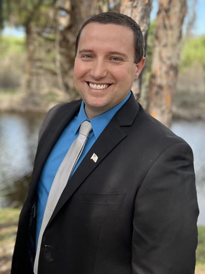 Man in suit smiling