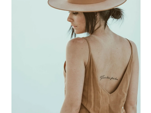 Small and subtle back small tattoo