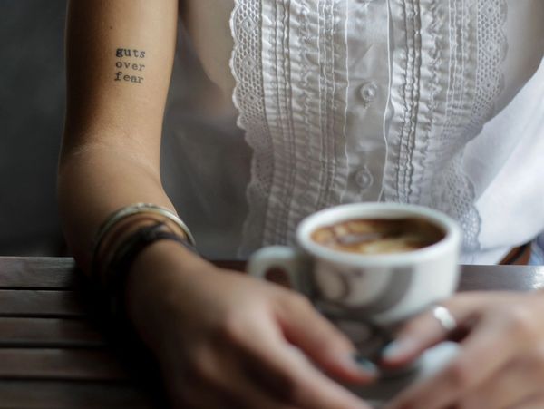 Beautiful upper arm small tattoo women