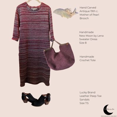 A styled outfit with a striped sweater dress, crochet tote, leather sandals, and a carved mother-of-pearl brooch.