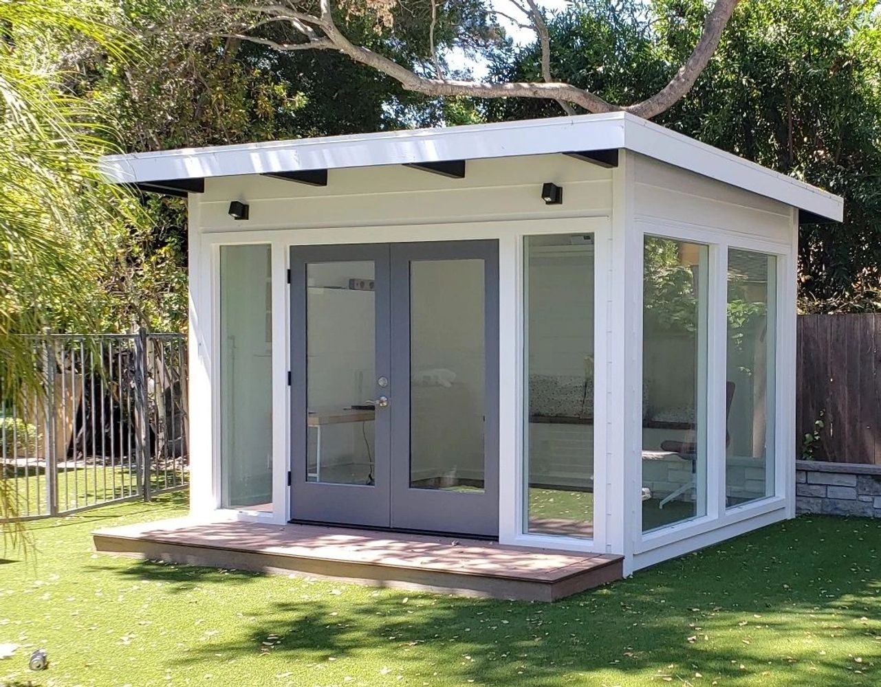 Modern shed in white with French doors