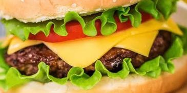 Fat Dog City serves premium, all-beef hot dogs tucked into soft, fresh Aunt Hattie’s buns and loaded