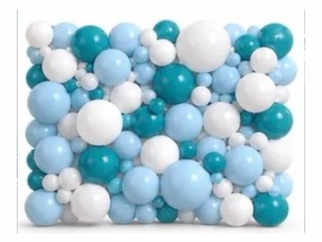 A colorful arrangement of blue and white balloons of various sizes.