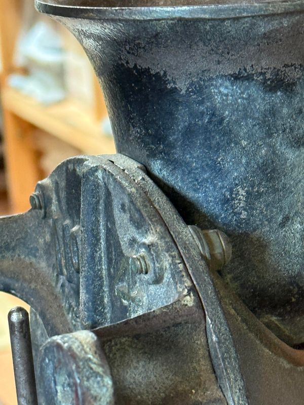 antique hand-cranked spice mill