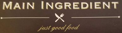 A sign displaying 'MAIN INGREDIENT' and 'just good food'.