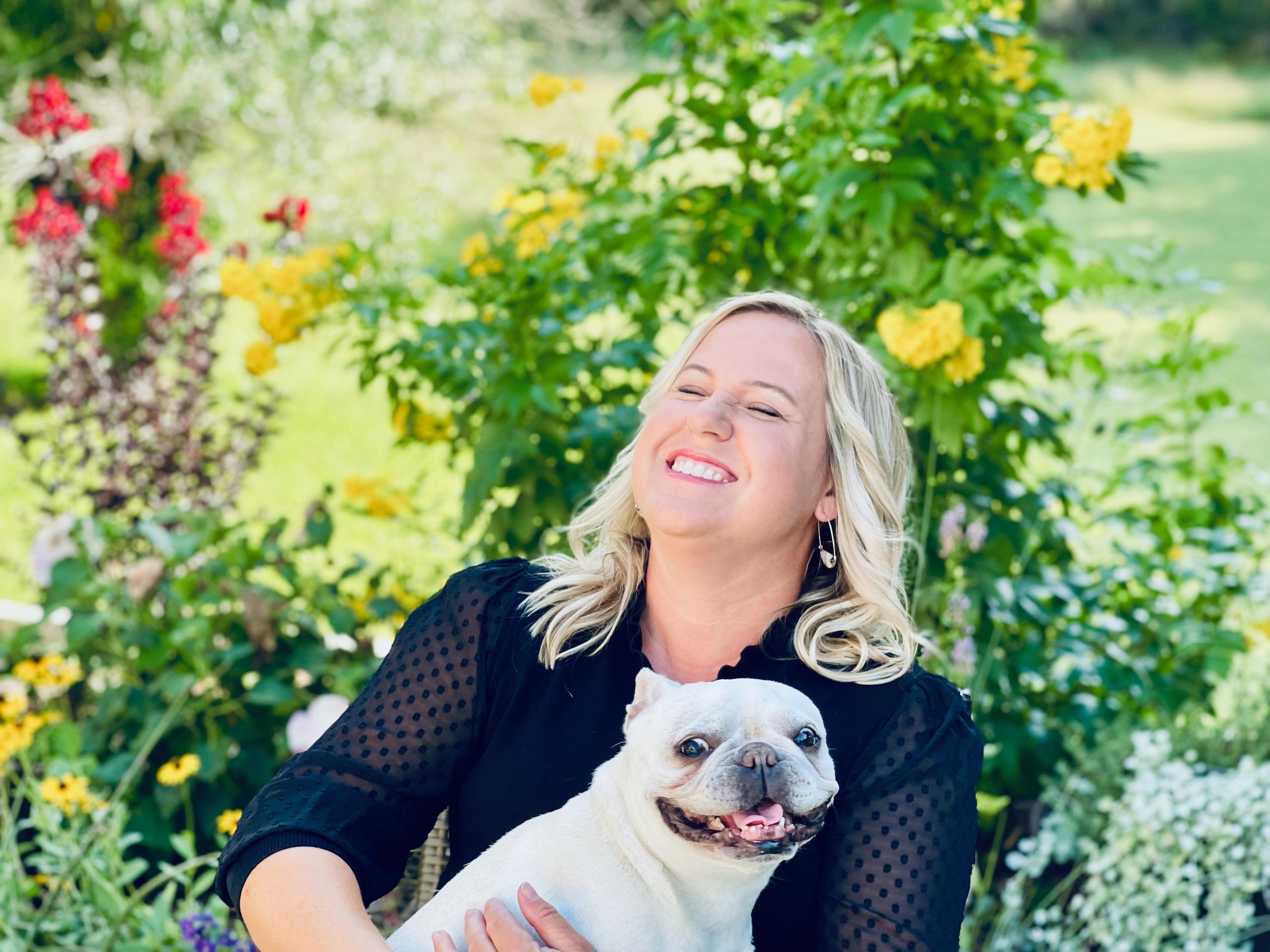 Therapist smiling with a dog