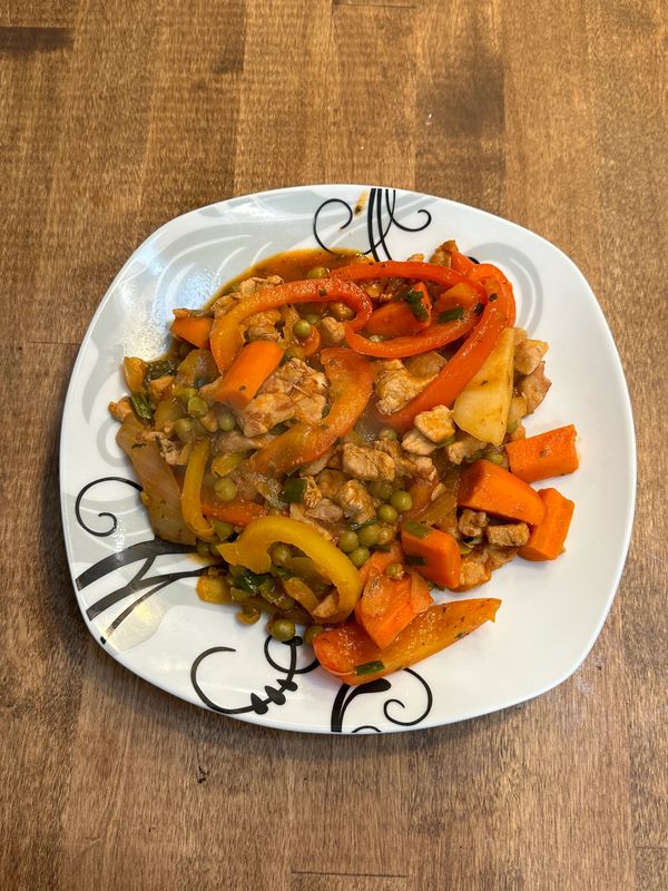 A vibrant Filipino dish served fresh from Halika World Kitchen
