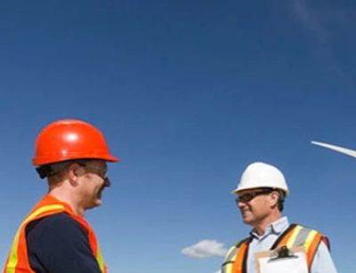 Wind turbine auditors for ISO 50001 undertaking energy audits. 