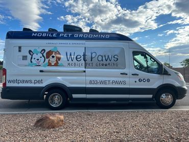 Passenger side view of a mobile grooming van 