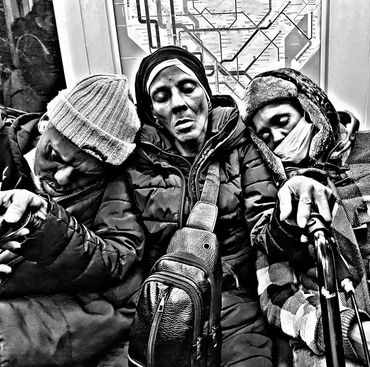 Three people asleep on public transit with a map behind them.