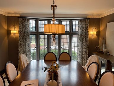 Functional Draperies In a dining room.