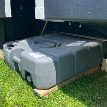 Black water holding tank under an RV, Travel Trailer during a home remodel.