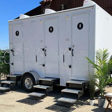 Luxury restroom trailer outside of the CLP Services office.