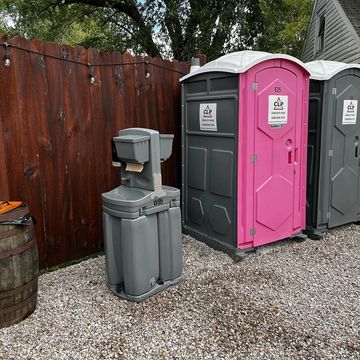 Men's and women's restroom at coffee shop parking lot in Ohio.