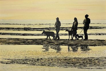 Three women  and their dogs walking on the sand at low tide.