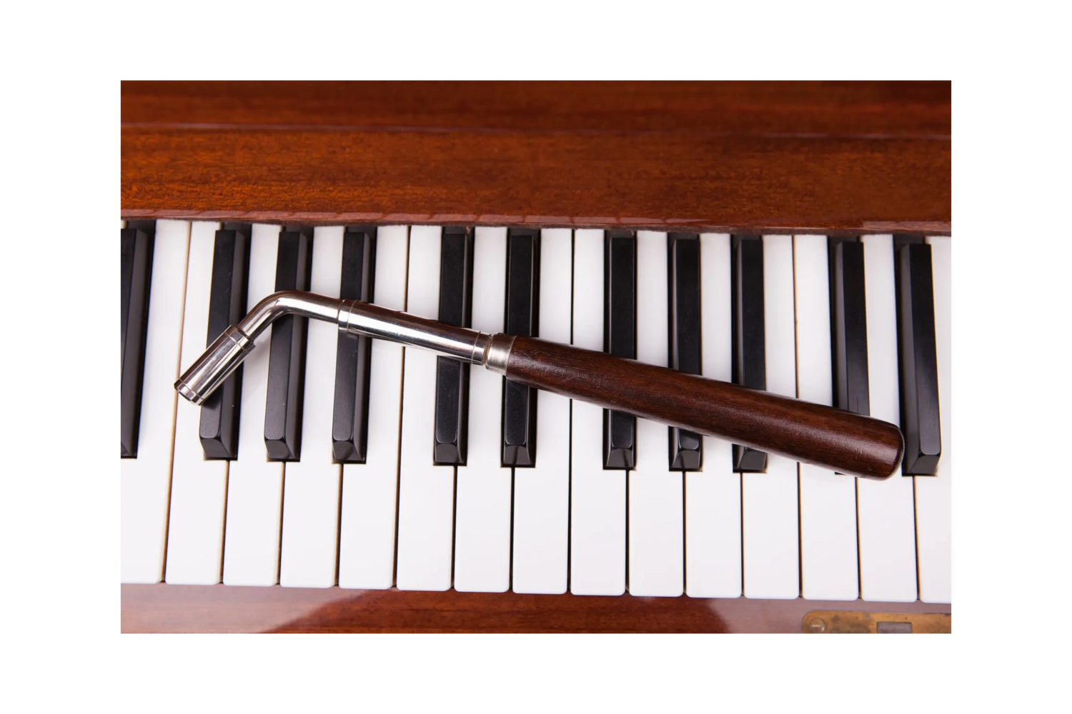 Tuning hammer on piano