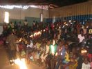 Children attending a schooling session. Many child have no mother or father.  