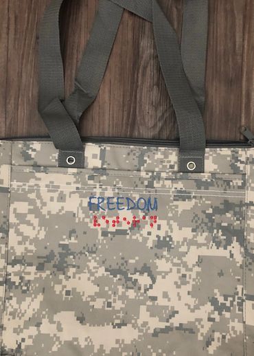 Camouflage bag, Freedom in print, veteran in Braille