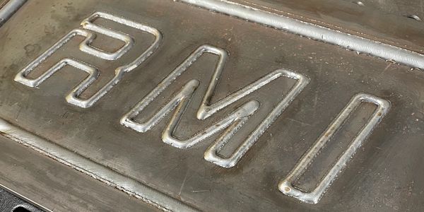 Custom fabrication options welded logo